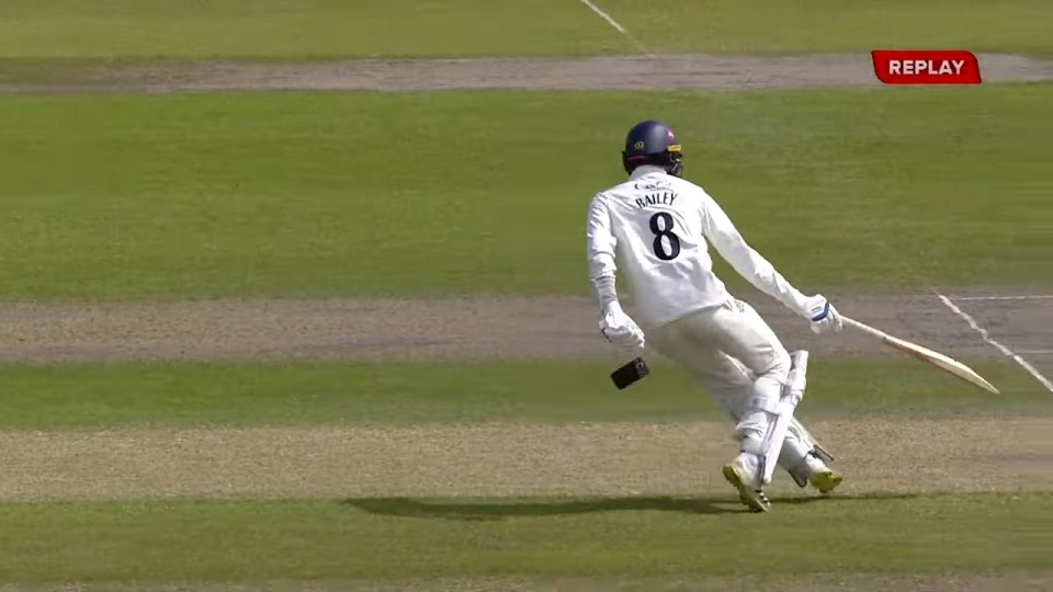 Replay of a cricketer dropping his phone while running.