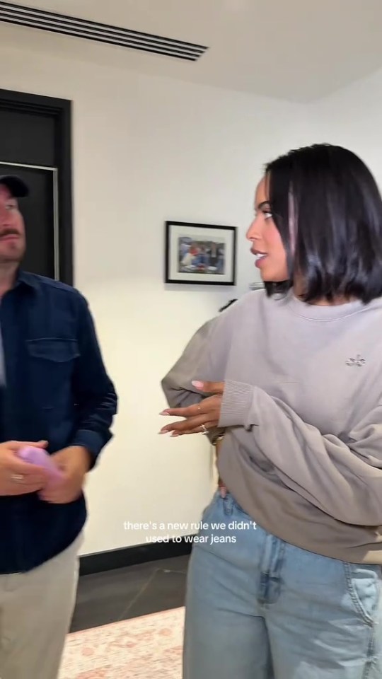Two people talking, one says "there's a new rule we didn't used to wear jeans".
