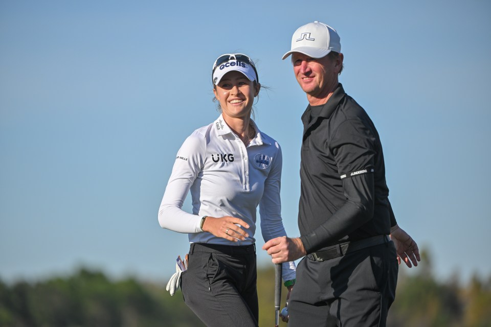 Nelly Korda hugging her father, Petr Korda, at a golf tournament.