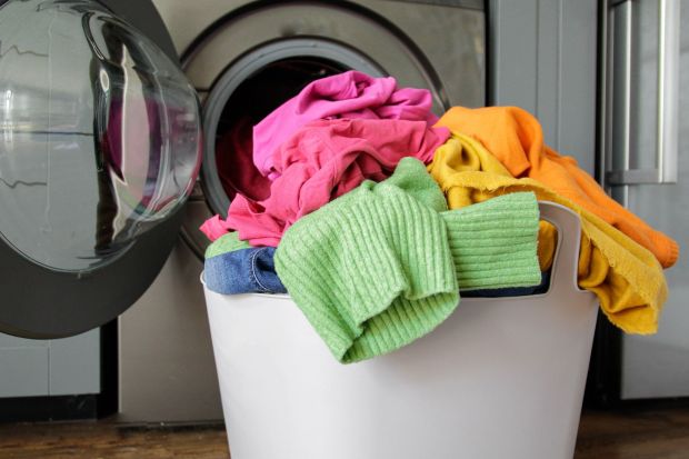 An image collage containing 1 images, Image 1 shows Laundry basket overflowing with colorful clothes in front of a washing machine