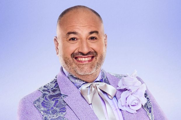 An image collage containing 1 images, Image 1 shows Wynne Evans, Strictly Come Dancing contestant, in a lavender suit