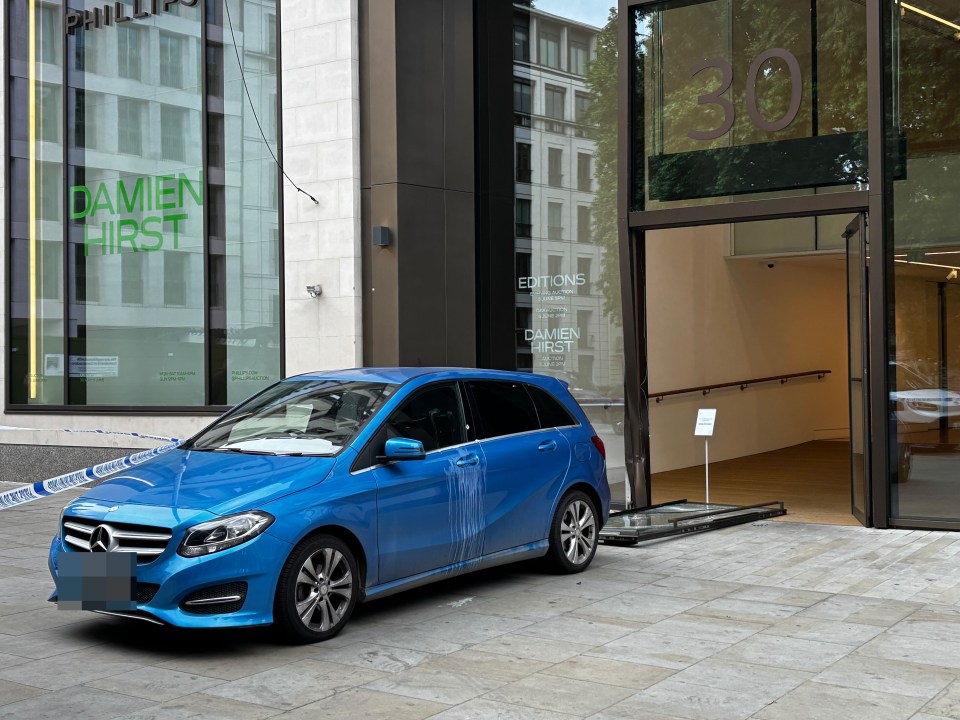 Blue car crashed into the Philips Gallery in Mayfair.
