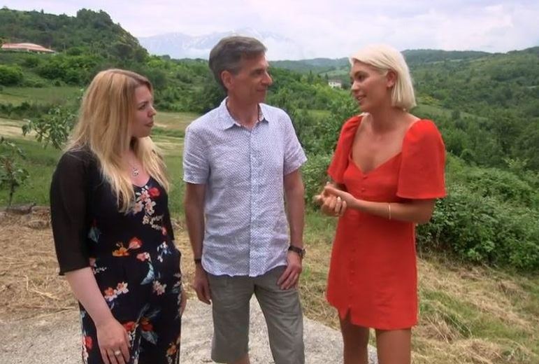 A Place in the Sun: Danni Menzies with a buyer and a man.