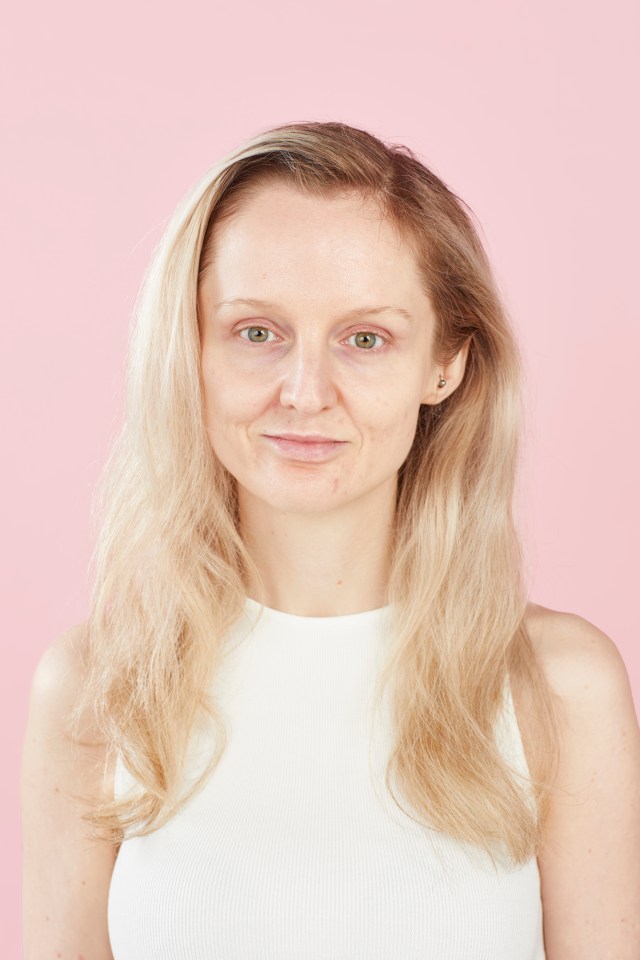 Woman with blonde hair and no makeup.
