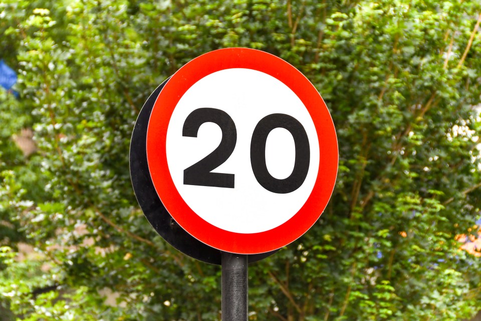 20 mph speed limit sign.