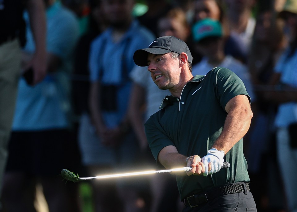 Rory McIlroy of Northern Ireland playing golf.