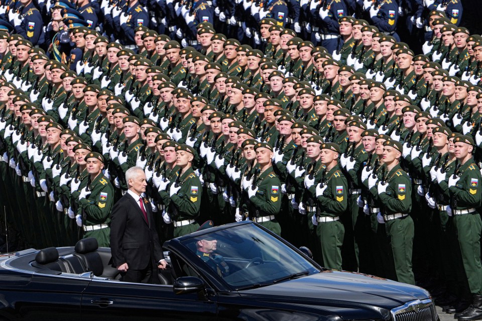 Russia's Defence Minister Andrei Belousov in a car during a military parade.