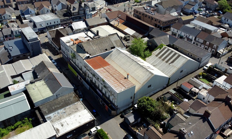 Aerial view of a derelict indoor market.