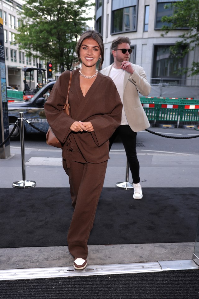 Samie Elishi arriving at a Market Place Food Hall party.