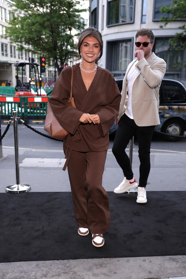 Samie Elishi arriving at a party.