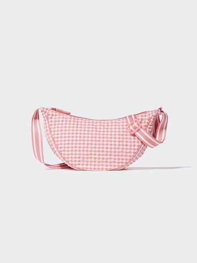 Pink gingham crossbody bag.