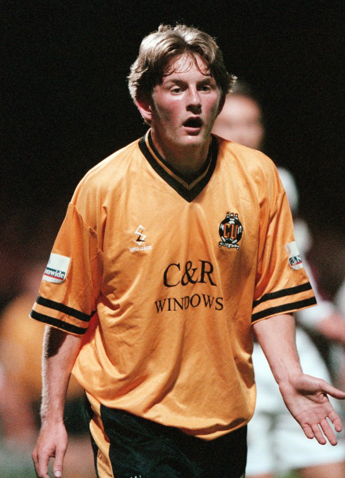 Tom Youngs of Cambridge United in action during a soccer match.