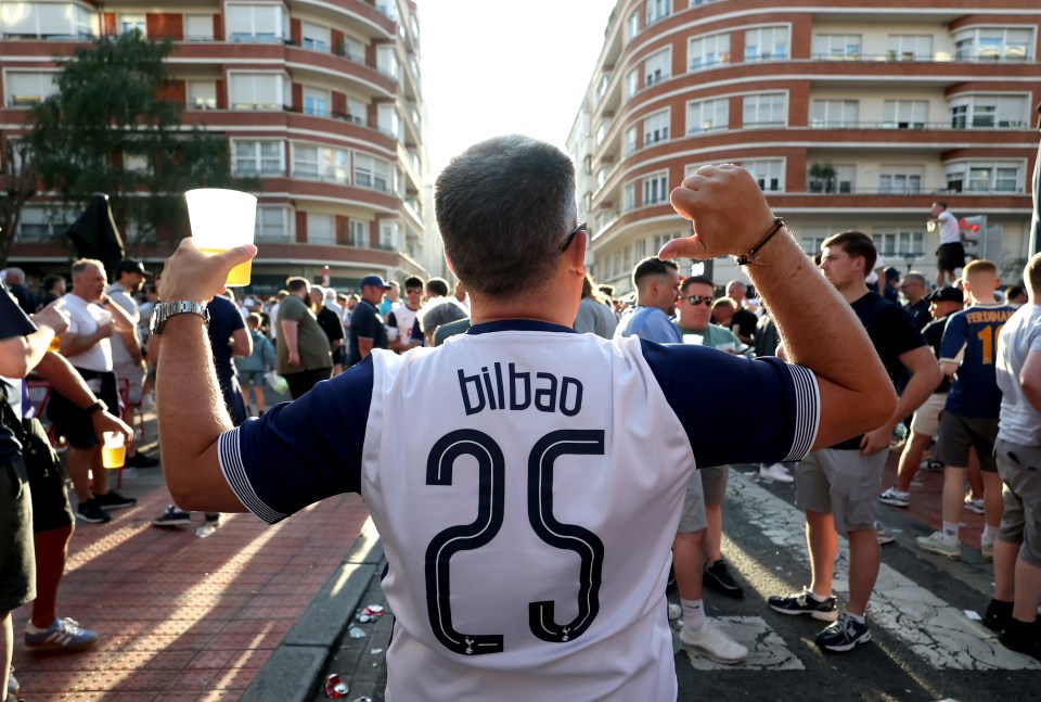 Tottenham Hotspur fan wearing a "Bilbao 25" shirt.