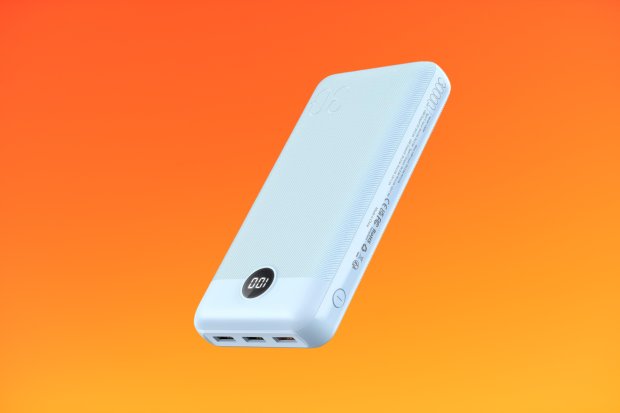 Light blue power bank with three USB ports and a digital display.