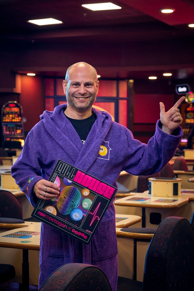 A man in a purple robe holds a record based on a bingo player's heart rate.