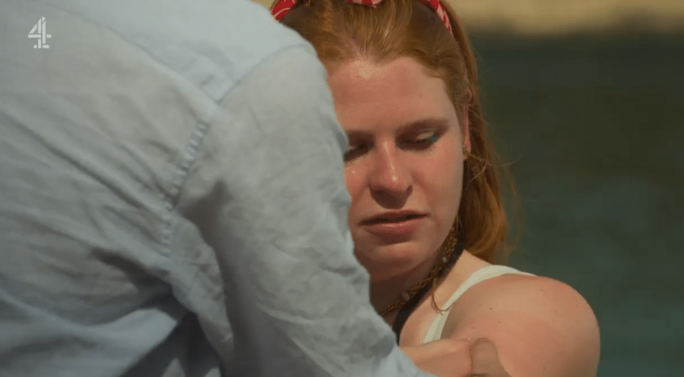 Charlotte and Jason having an awkward encounter on a beach.