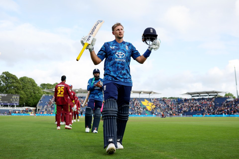 Joe Root of England celebrates an unbeaten 166 runs in a cricket match.