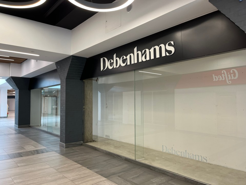 Empty Debenhams store in a shopping mall.