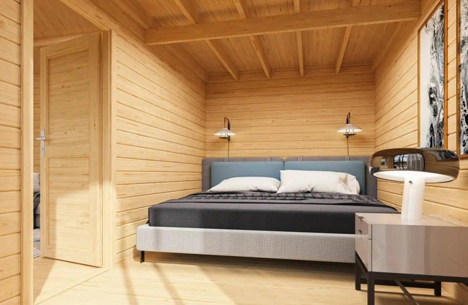 Bedroom in a log cabin.