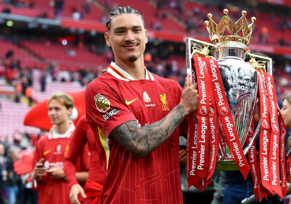 epa12134968 Liverpool player Darwin Nunez celebrates with the Premier League trophy after the English Premier League match between Liverpool and Crystal Palace in Liverpool, Britain, 25 May 2025. EPA/PETER POWELL EDITORIAL USE ONLY. No use with unauthorized audio, video, data, fixture lists, club/league logos, 'live' services or NFTs. Online in-match use limited to 120 images, no video emulation. No use in betting, games or single club/league/player publications.