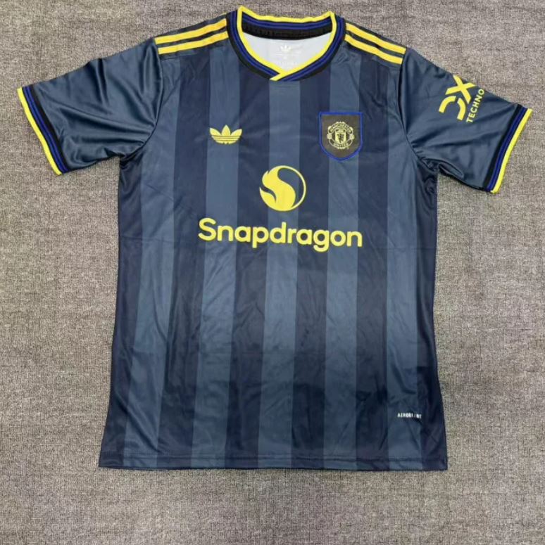 Manchester United soccer jersey with Snapdragon sponsor.