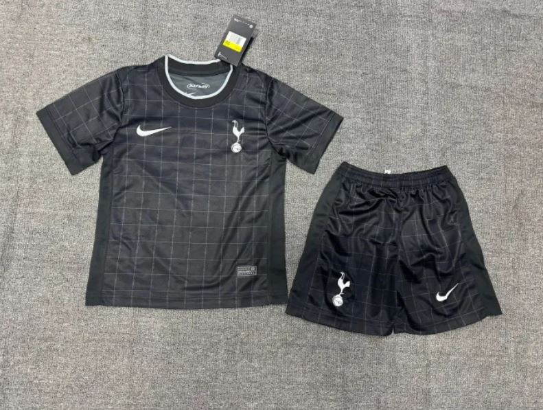 Black Tottenham Hotspur youth soccer jersey and shorts.