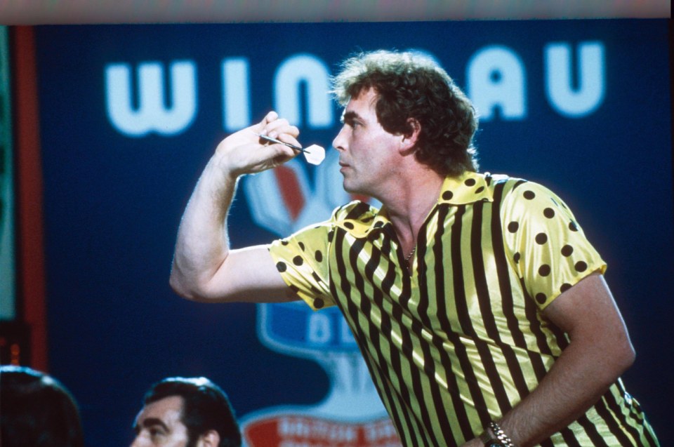 Bobby George throwing a dart at the 1982 Winmau World Darts Championships.