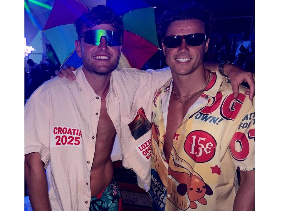 Two men posing together at night, one wearing a shirt that says "Croatia 2025".