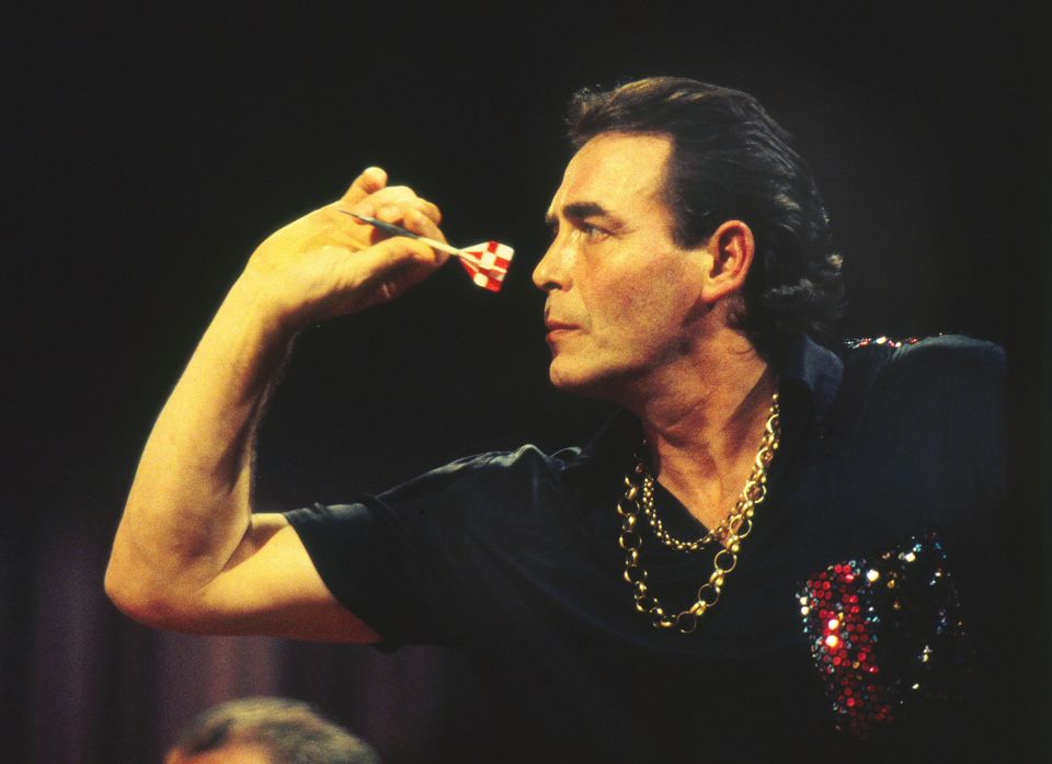 Bobby George throwing a dart at the 1993 BDO Embassy World Darts Championship.