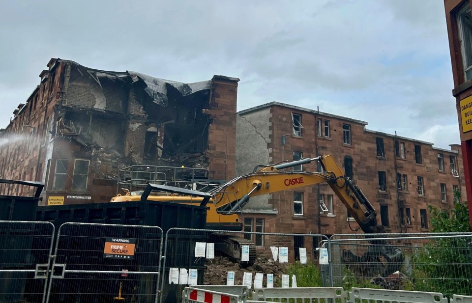 Demolition of a fire-damaged building.