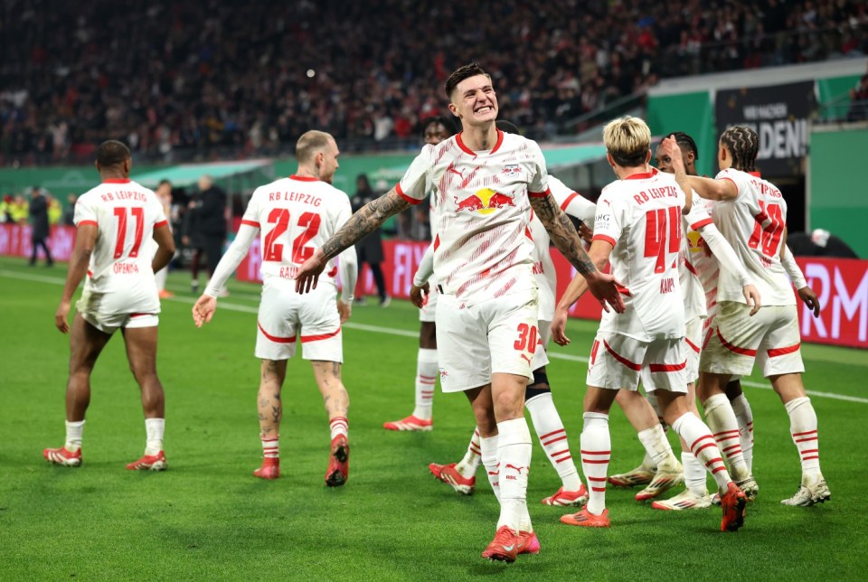 LEIPZIG, GERMANY - FEBRUARY 26: Benjamin Sesko of RB Leipzig celebrates scoring his team's first goal from a penalty during the DFB Cup quarterfinal match between RB Leipzig and VfL Wolfsburg at Red Bull Arena on February 26, 2025 in Leipzig, Germany. (Photo by Maja Hitij/Getty Images)