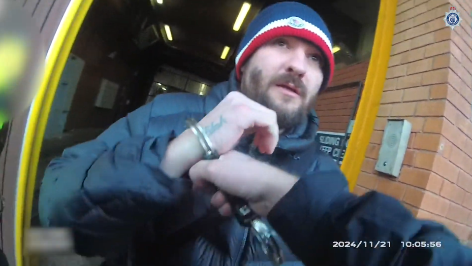 Man in handcuffs.
