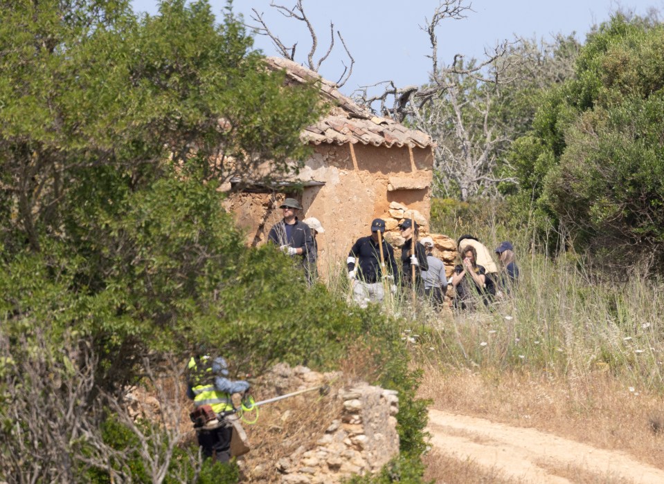 Police searching scrubland near an abandoned house for evidence in the Madeleine McCann case.