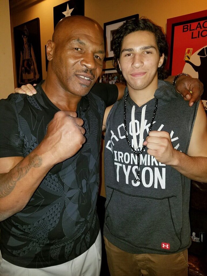 Mike Tyson with Nico Ali Walsh.